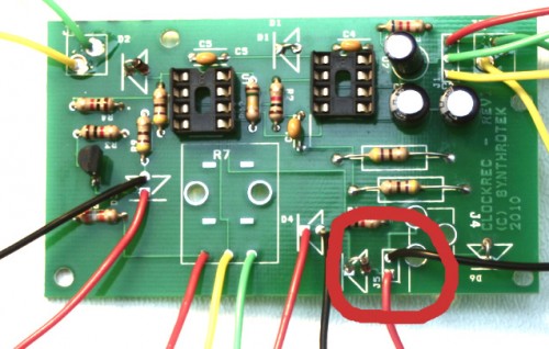 Step 9: Battery Clip Make sure the red and black wires of the battery clip match the area circled in red.