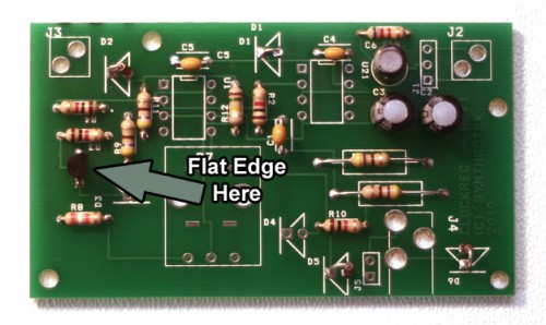 Step 3: Transistor Make sure to align the flat edge of the transistor to the arrow.
